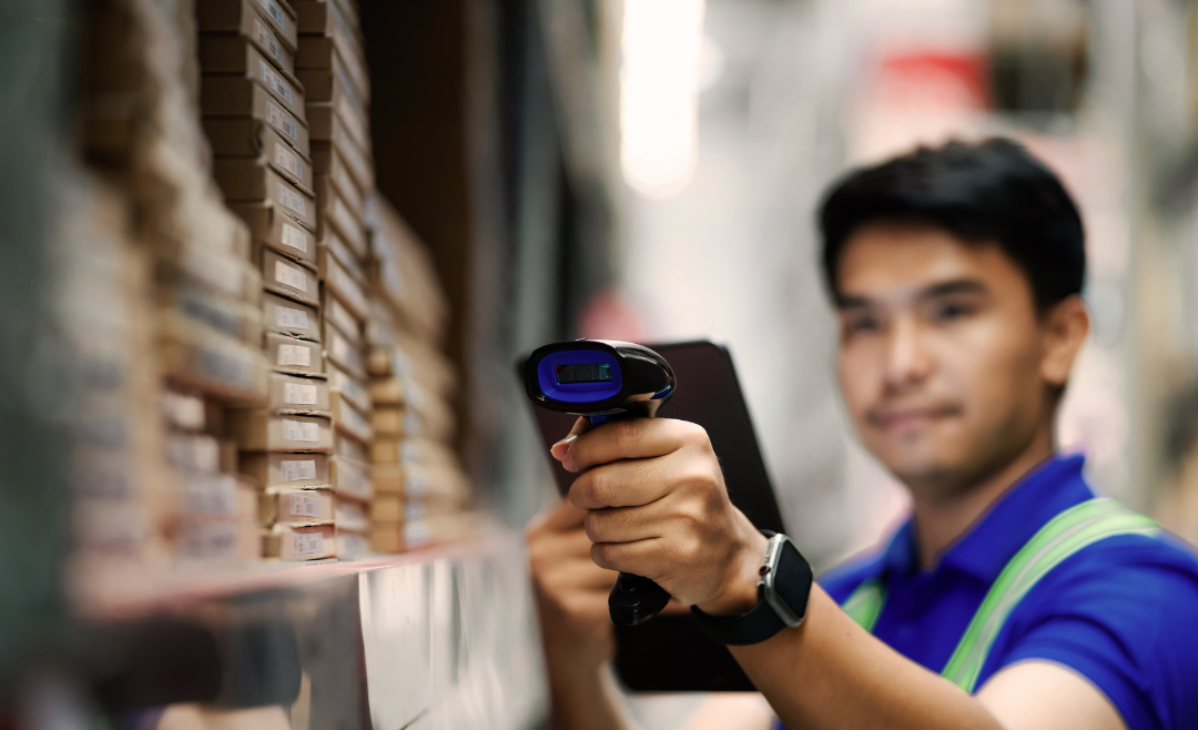 Man holding barcode scanner