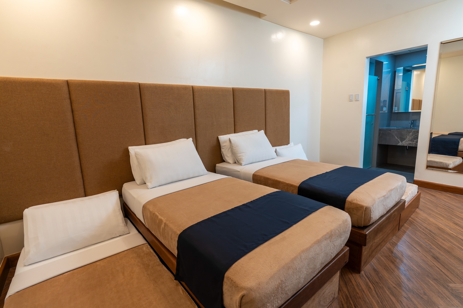 Kabayan Hotel - Deluxe Room Quad1