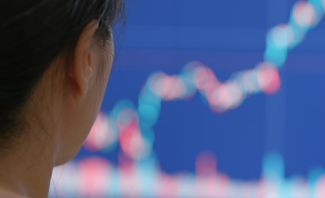 Woman watching stocks