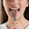 EXPLAINER: Why tongue scraping is just as important as brushing your teeth